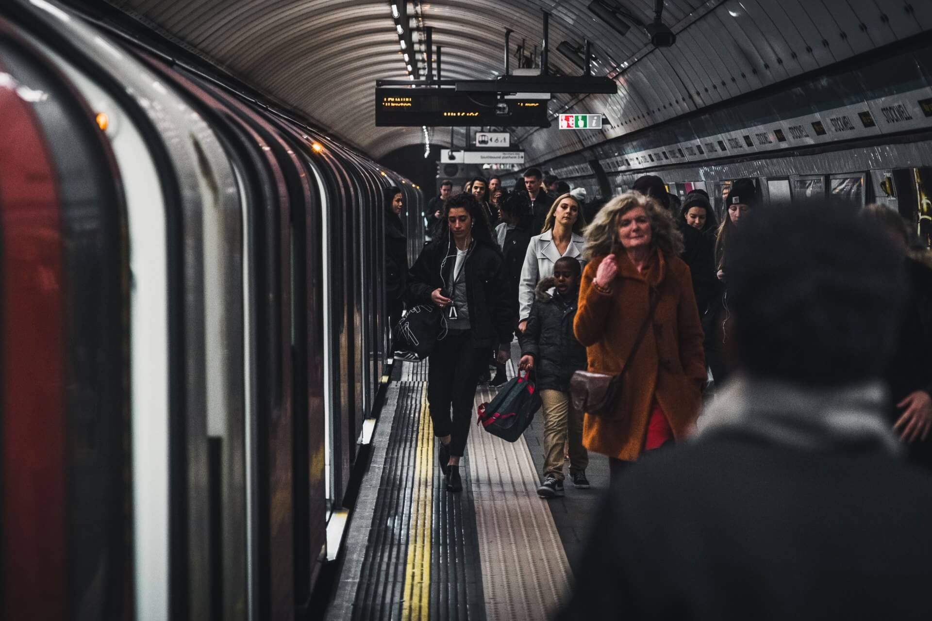 Passengers disembark a London Underground train on the Northern Line at Stockwell (Photo by Luke Stackpoole on Unsplash)