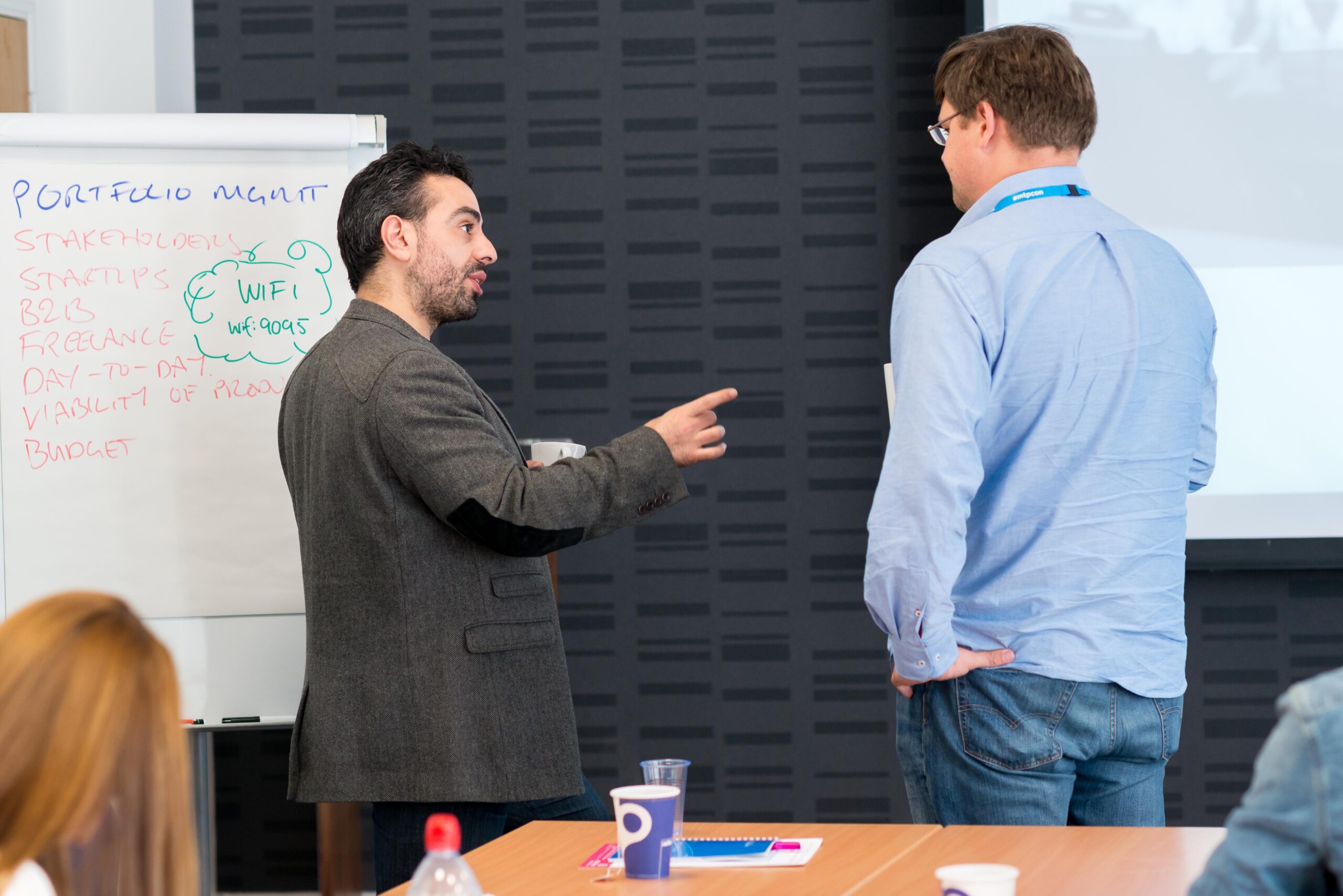 Jock talks with a training attendee